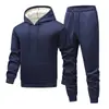Traje premium de lana de cordero estilo europeo transfronterizo, chaqueta con capucha para hombre, conjunto de sudadera engrosada forrada de forro polar cálido de invierno para hombre