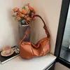 Coleção nova de 2026: design de nicho, bolsa plissada para o dia a dia, bolsa transversal estilosa, bolsa trendy de PU de cor sólida de alta qualidade em formato de bolinho