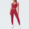 Conjunto de roupa de yoga com bloqueio de cores transfronteiriço, tecido escovado com toque nude, justo ao corpo, com design esportivo nas costas, calça longa de cintura alta que levanta o bumbum para corrida e fitness