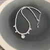 Collar de perlas de plata rotas redondas con diamantes brillantes, colgante geométrico de circonita para mujer, diseño de nicho, personalidad explosiva súper brillante de primavera y verano.