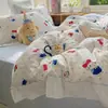 Conjunto de cuatro piezas de encaje de algodón puro estilo princesa coreana, conjunto de tres piezas de funda de edredón para dormitorio de algodón lavado estilo fresco y cremoso de Instagram