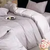 Juego de ropa de cama de cuatro piezas jacquard 100% algodón estilo lujo, sensación de alta gama para dormitorio principal, funda de edredón de algodón puro, sábana, ropa de cama para todas las estaciones 1.8m