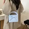Bolso sencillo y exquisito con lazo para mujer, nuevo y elegante 2026, bolso versátil de alta gama para hombro y bandolera