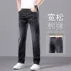 Jeans retos de caimento solto para primavera e outono para homens, nova coleção 2026, calça masculina azul-acinzentada casual e moderna, novo estilo de outono