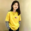 Camiseta de manga larga de dibujos animados para niña, prenda interior de otoño, nuevo modelo 2026, camiseta básica de algodón puro de dos piezas simuladas para niños talla mediana y grande