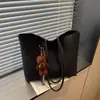 Bolso tote de mujer más vendido transfronterizo, gran capacidad, nuevo modelo 2026, bolso de hombro simple para el día a día, adecuado para ir de compras y al trabajo, bolso de axila