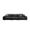 Sofá de couro preto em estilo minimalista moderno italiano, adequado para espaços pequenos, com design robusto e arranjo reto