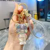 Llavero de Oso de Resina Transparente Blanco con Hojuelas Doradas Dibujo Animado Muñeca de Resina con Polvo Dorado Colgante Lindo para Bolso Pequeño Regalo