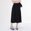 2026 Novo Estilo de Verão Saia Casual Feminina com Cintura Elástica, Design Clássico de Botão de Flor em Cor Sólida, Saia Emagrecedora, Tendência