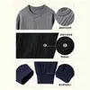 Ropa de punto nueva para hombre transfronteriza en stock, exportación de tallas europeas y americanas, cuello redondo, manga larga, cárdigan casual simple de punto trenzado