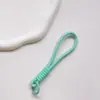 Correa de Muñeca Trenzada Estilo Ins Lanyard Nudado Cuerda Corta de Silicona Colgante Antiperdida para Teléfono Dopamina
