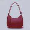 Moda Europeia e Americana Casual Versátil Bolsa de Meia-Lua para Comutação para Mulheres, Modelo Transmitido ao Vivo, Lançamento Este Ano, Bolsa de Ombro de Couro Genuíno de Primeira Camada