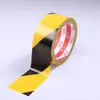 Cinta de advertencia amarilla y negra al por mayor cruce de peatones cebra negro y amarillo taller piso 5S color logo línea de logo cinta para piso