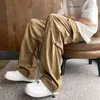 Calça Casual Branca com Design de Rebites para Meninos Outono 2025 Estilo Europeu e Americano Hiphop Reta Solta Calça Cargo para Lenhador