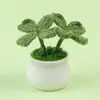 Planta de interior popular de trébol de cuatro hojas artificial, planta verde artificial tejida, artículo decorativo creativo de alto valor, regalo de la suerte, venta al por mayor desde el fabricante