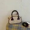 Bolso de Mano de Lunares Elegante de Diseño de Nicho para Mujer 2026 Nuevo Otoño/Invierno Versátil para Viajar Cruzado Pequeño Bolso Tote