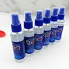 60ml Limpador de óculos transparente inglês líquido de limpeza para óculos água de limpeza especial para lentes limpeza de tela de celular