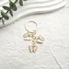 Llavero de mariposa nuevo transfronterizo aleación de zinc europea color llavero de mariposa monarca pequeño exquisito colgante para bolsa