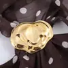 Comercio Exterior al por Mayor Ropa Nueva de Verano para Mujer Top sin Mangas Sexy con Cuello Halter Adornado de Lunares