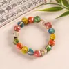 Fornecimento de fábrica pulseira de cerâmica design retrô estilo nacional pulseira de contas multicoloridas estilo nacional joias de pulseira atacado pulseira homens e mulheres