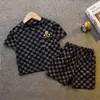 Moda de Verano 2026 Ropa Nueva para Niños Estilo Coreano Conjunto para Niños Dibujos Animados Manga Corta Shorts Conjunto de Dos Piezas Elegante Moderno