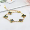 Bestseller transfronterizo pulsera de trébol de 13 mm en color oro de 18 quilates con nácar a doble cara, nuevo estilo de moda, pulsera versátil y elegante