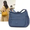 2025 Nueva Bolsa Cruzada de Gran Capacidad Bolsa Ligera de Tela Bolsa para Madres de Mediana Edad Bolso de Hombro con Compartimentos Grandes Mochila de Viaje para Mujeres