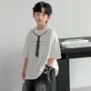 Camiseta de Manga Corta para Niños Ropa de Verano 2026 Nueva Camiseta de Verano para Niños Niños Medianos y Mayores Estilo Verano Manga Corta Camiseta de Moda Venta al por Mayor