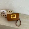 Bolsa de Mão Fashion de Luxo Leve Estilo Coreano Bolsa Quadrada Pequena para Mulheres Nicho Tendência Versátil Bolsa Transversal Personalizada Estilosa para o Dia a Dia Bolsa de Ombro Único