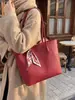 Bolsa de Gran Capacidad para Viajes Diarios 2026 Nueva Bolsa Tote para Mujeres Bolso Casual Diseño de Nicho Bolsa para el Trabajo/Escuela Bolsa Portátil