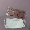 A NOSOTROS. Nueva Moda Forma de Mariposa Estilo Universitario Color Morandi Mascarilla Desechable Ola de Nube Mascarilla ins
