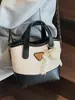 2025 Nova Bolsa Saco Estilo Coreano Simples e Fashion para Mulheres para o Trabalho e Deslocamento, Bolsa Transversal Versátil de Alta Qualidade