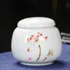 Lata de Té de Cerámica Sellada Lata Pequeña Ciruelo Orquídea Bambú Crisantemo Té de Flor Tieguanyin Polvo Perfumado Artículo de Almacenamiento Caja de Embalaje de Té