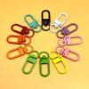 Pintura de color hebilla de puerta dorada hebilla de puerta en forma de U llavero giratorio accesorios de joyería diy hebilla colgante hebilla de puerta pequeña perro