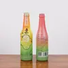 Película termorretráctil de PVC personalizada para botellas de jugo, botellas de vino, botellas de vidrio, empaque de botellas de plástico, película de sellado PET con logotipo impreso a color, venta al por mayor