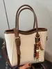 Bolso tipo bandolera cubo de aspecto elegante para mujer 2025 Invierno Nuevo Bolso de mano casual Popular Bolso de hombro Bolso cruzado retro