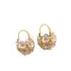 Pendientes de Flor de Perla Dorada para Mujer Lujo Ligero Gama Alta Únicos de Nicho Pendientes de Cesta de Flores Microincrustada Nuevo Estilo 2025