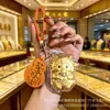 Llavero de Oro Año de la Oveja Ten Dinero para Gastar Llavero de Teléfono de Oveja Pequeña Colgante para Bolso Caja de Regalo de Año Nuevo Controlador de Tráfico de Transmisión en Vivo