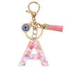 Llavero de Moda Rosa de Venta Caliente Transfronterizo Letra Inglesa Ojo del Diablo Borla Colgante para Bolso Llavero Multifuncional