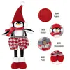Nuevas decoraciones navideñas transfronterizas: figura de pingüino retráctil, adorno de pingüino navideño rojo y gris para decoración de ventana