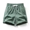 Homens casuais cor sólida três quartos shorts respiráveis elástico solto shorts retos homens seda gelo casual calças de praia para homens