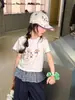 Ropa Infantil Floral y Xun Pantalones Largos para Niña 2026 Verano Nuevo Estilo Coreano Cuadros Falso Dos Piezas Versátil para Superponer Moderno