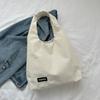 Bolso de lona sencillo de gran capacidad y moda para mujer, nuevo estilo 2023, bolso de pana portátil para hombro y axila.