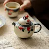 Tetera de Cerámica Estilo Antiguo Pintada a Mano con Filtro de Agujero de Bola para Juego de Té Kung Fu por Moji Caramelo Glaseado Qing Dai Melocotón