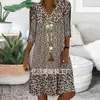 2026 Amazon AliExpress Wish coleção de verão nova: vestido estampado, manga média, decote V, comprimento médio, vestuário feminino transfronteiriço