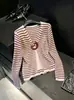 Estilo coreano 2026 otoño nuevo broche floral versátil cárdigan de punto a rayas para mujer top de manga larga color principal color liso