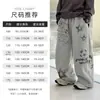 Otoño 2026 Nuevo Pantalón de Chándal Ancho con Graffiti para Niños Pantalones Largos Deportivos Casuales Sueltos Ropa Infantil Zhili Venta al por Mayor