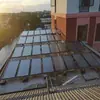 Bomba de Calor de Energía Aerotérmica para Servicio de Salud Comunitario de Shanghái Combinada con Sistema de Recolección de Calor Solar de Panel Plano Omer Lang