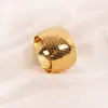 Suministro a Bajo Precio Hotel Restaurante Habitación Modelo Botón de Servilleta Anillo para Servilleta Oro Plata Patrón Hueco Anillo para Servilleta