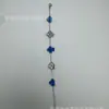 Pulseira Trevo de Quatro Folhas Versão Alta 13mm Transfronteiriça Leve Luxo Simples Natural Madrepérola Laser Versátil Pulseira Atacado